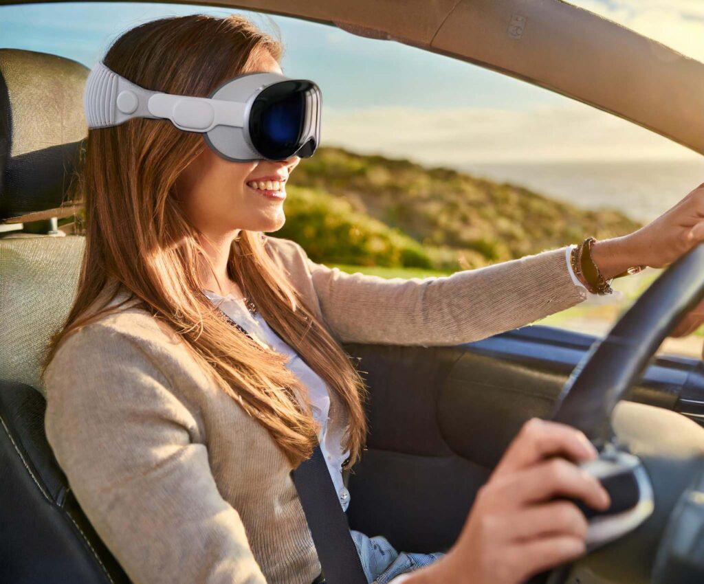 A female driver, driving while wearing an Apple Vision Pro headset.
